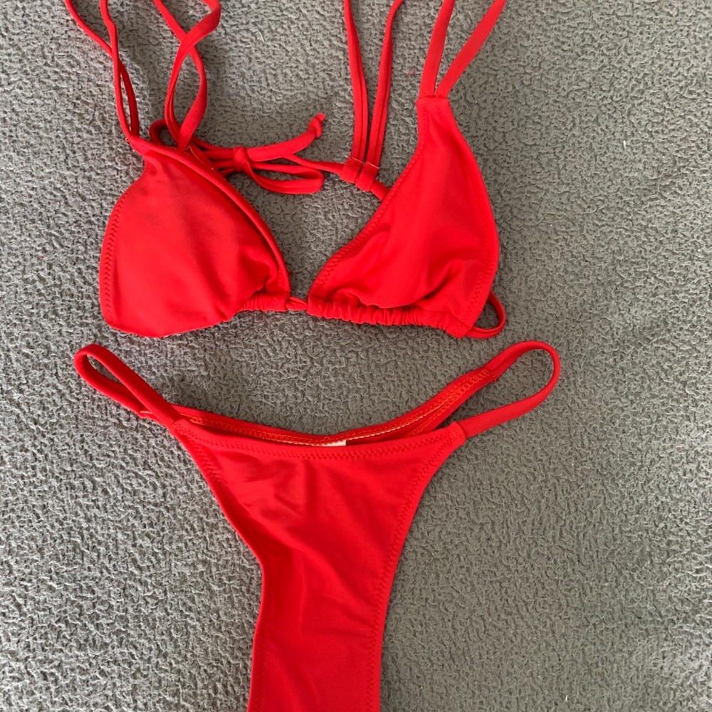 8 bikinis (1 is a one piece) assorted colours